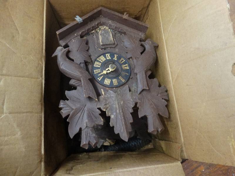 lot 322 image: Old wooden coo-coo clock.