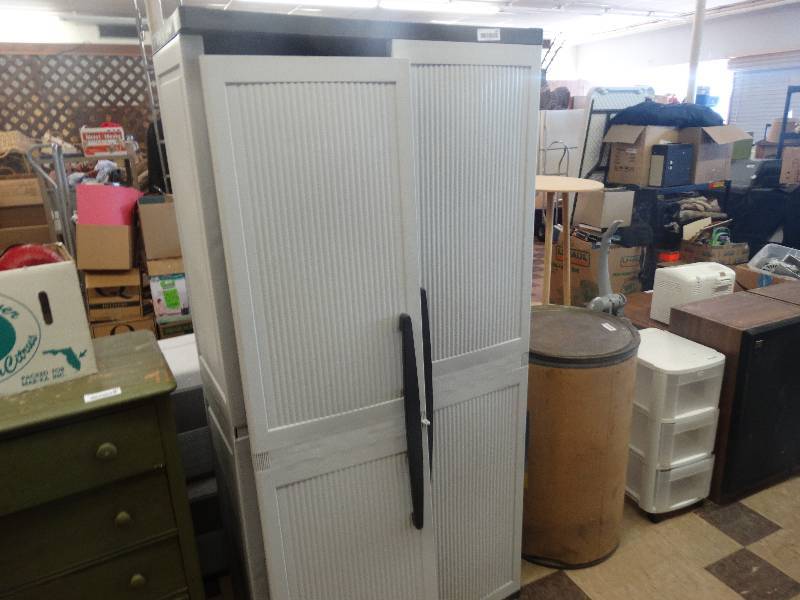 lot 341 image: Outdoor storage cabinet needs repair.