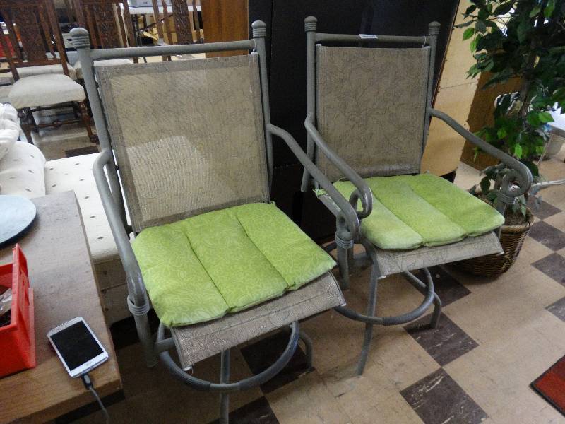 lot 352 image: Pair of patio swivel chairs.