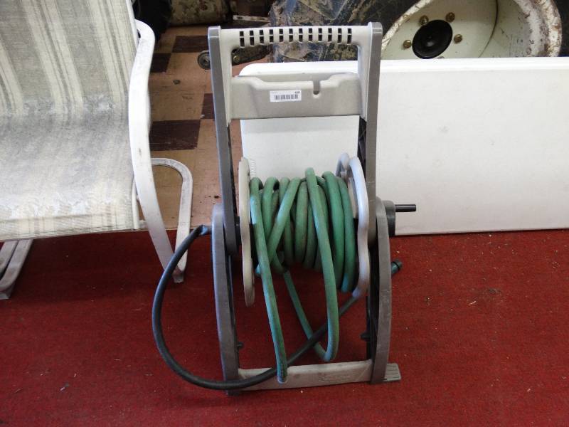 lot 488 image: Water hose & hose reel.