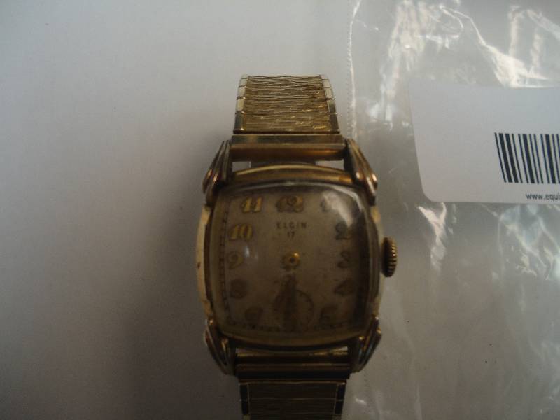 lot 5551 image: Elgin Watch.
