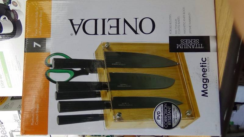 lot 2113 image: Set includes  1 each 8 Chef Knife, 7 Carving Knife, 7 Santoku, 5 Utility, 3.5 Paring, Kitchen Shears, BlockCutlery Made of Quality Stainless Steel with titianium coated bladesDishwasher safe, hand washing recommended