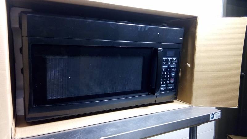 lot 6385 image: Magic Chef Microwave Ovens Over the Range Microwave. 1.6 cu. ft. in Black MCO165UB