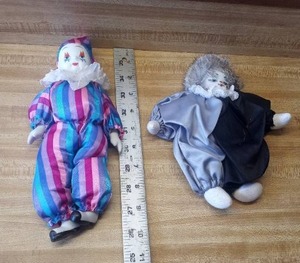 lot 9 image: Porcelain clowns