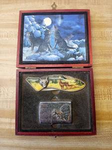 lot 27 image: Wolf pocket knife and lighter in wooden box