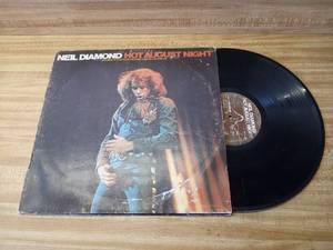 lot 73 image: Neil Diamond Hot August Night record only has 1 record side one and side four