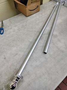 lot 65409 image: Silver Telescoping Curtain Rod