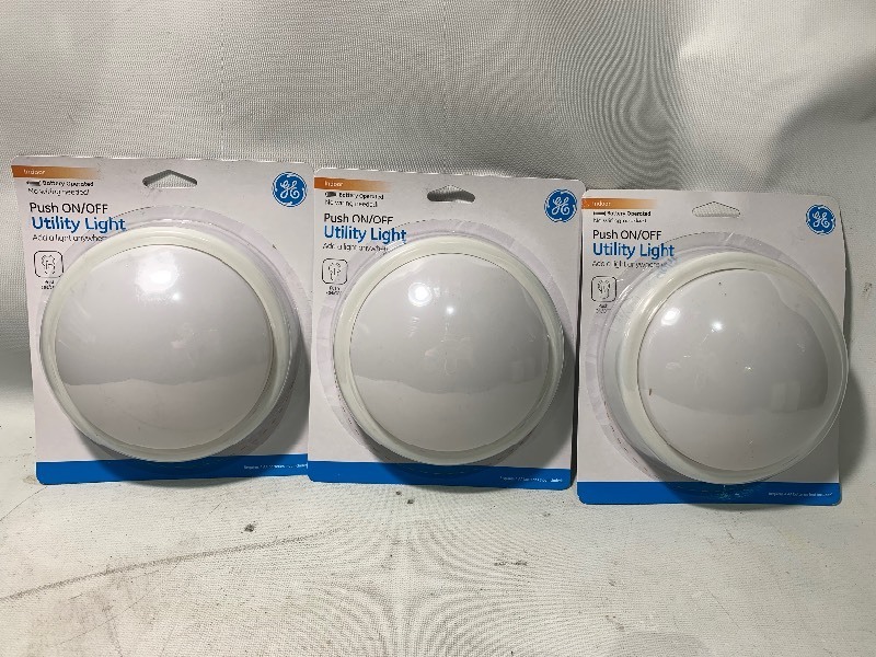 lot 141 image: 3 New GE Indoor No Wire Push ONOFF Utility Lights