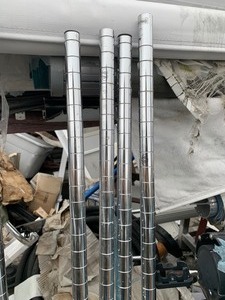 lot 25 image: 4 Stainless Steel 5ft Nexel Wire Shelf Legs