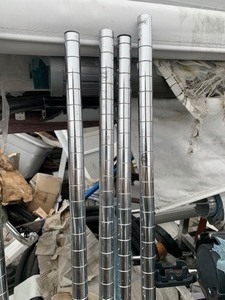 lot 27 image: 4 Stainless Steel 5ft Nexel Wire Shelf Legs