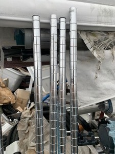 lot 26 image: 4 Stainless Steel 5ft Nexel Wire Shelf Legs