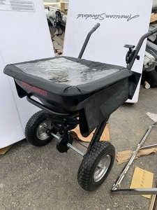 lot 66 image: New Precision Products 100 lb. Broadcast Fertilizer Spreader, Black