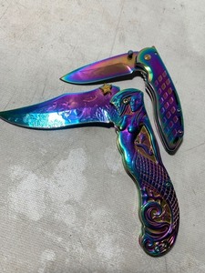 lot 33 image: Dual Masters Collection Iridescent Stainless Steel Pocket Knives