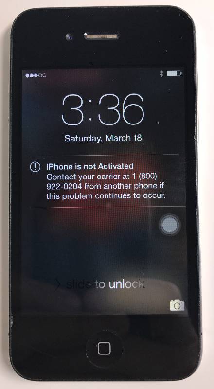 lot 3163 image: Apple iPhone 4 verizon with charger - powers up (service not included)
