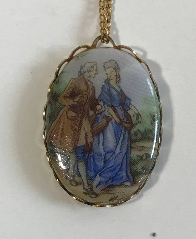 lot 3185 image: Avon Necklace with Pendant Royal Impression Colonial Man and Woman 16 with box and cover 1980