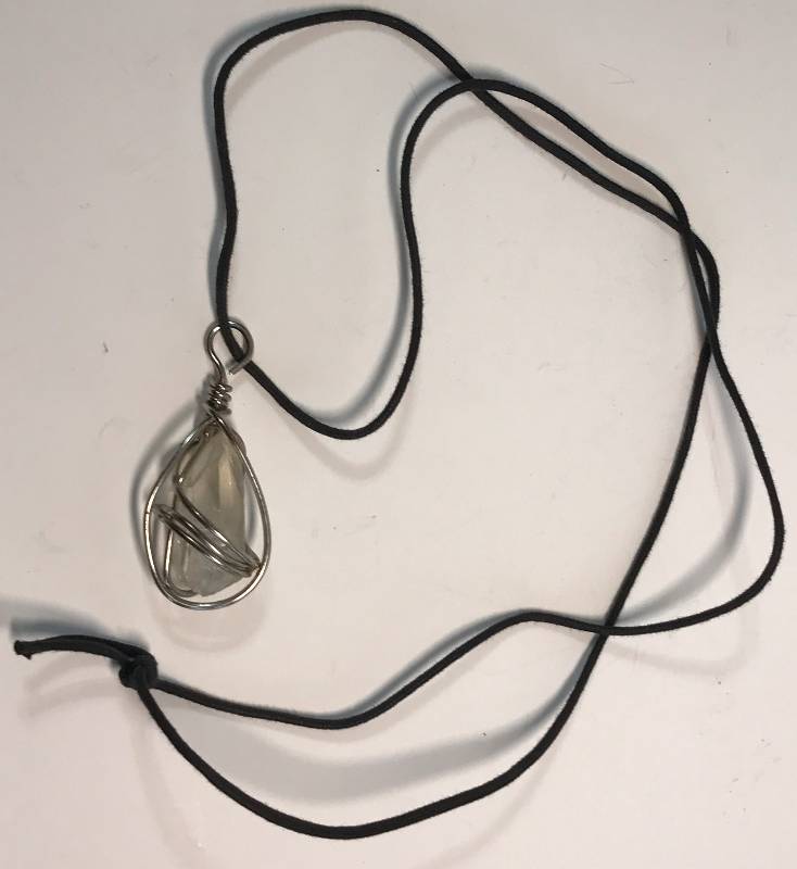 lot 3213 image: White Crystal or Quartz Pendant with Leather Chain