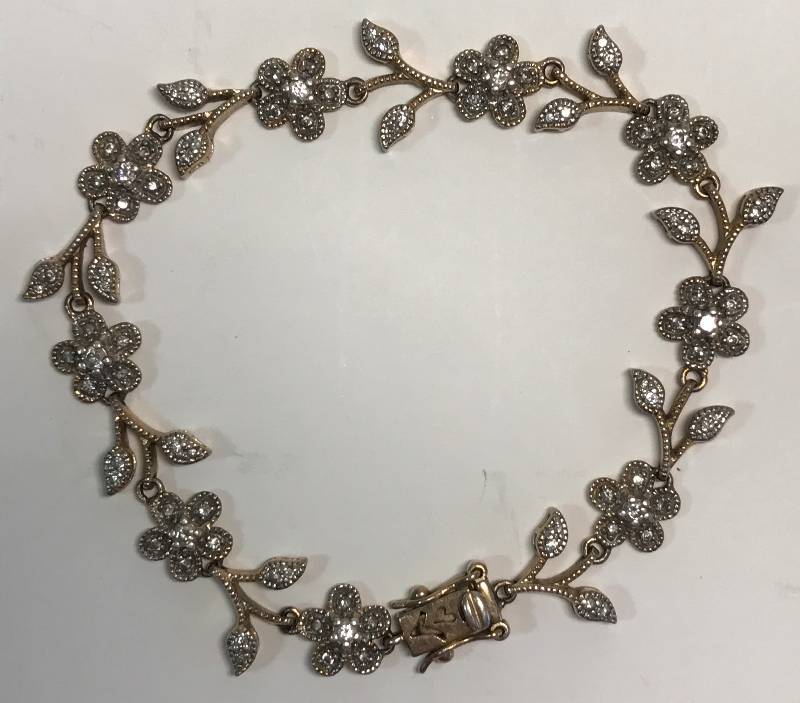 lot 3216 image: Vintage Sterling Silver Flower Bracelet With Clear Stones (my favorite of this auction) Bid on this one