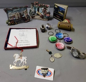 lot 127 image: Cars with Fins Book, Keychain, White House Ornament, Watch, Miniatures, Pirates, Porcelain Scenes