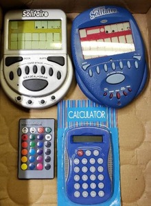 lot 153 image: Handheld Video Games, Lighting Remote, Calculator