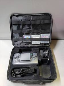 lot 179 image: Sega Game Gear Portable System, (4) Games & Deluxe Carry-All