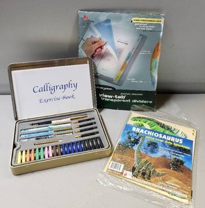 lot 192 image: NEW IN PACKAGE Calligraphy Set, Easy Assemble Dinosaur, Transparent View Tabs