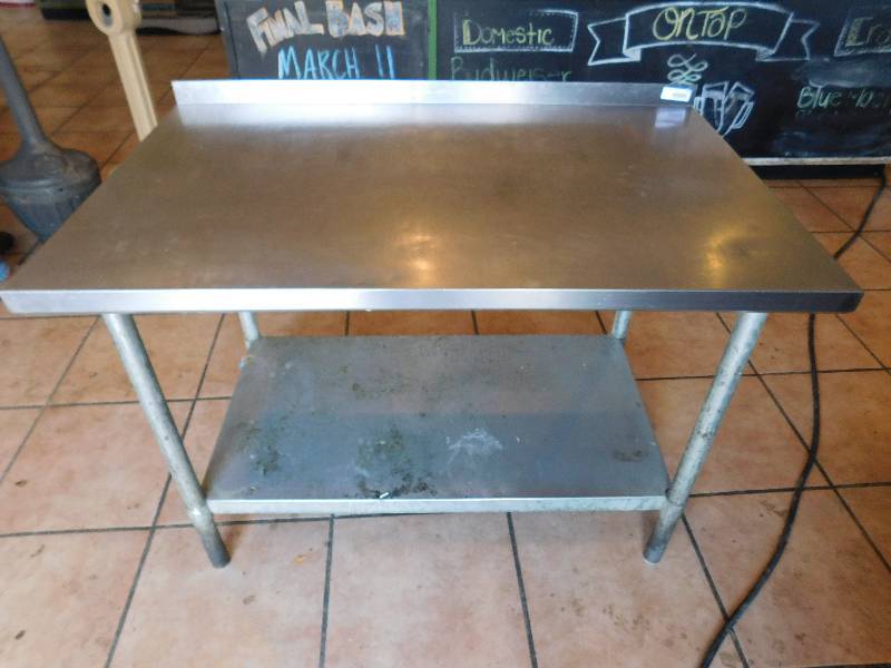 lot 718 image: 4 Foot Stainless Table