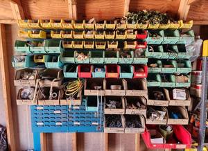 lot 3003 image: Wall Unit, Storage Bins and Contents - Buyer will need to bring tools to remove from wall