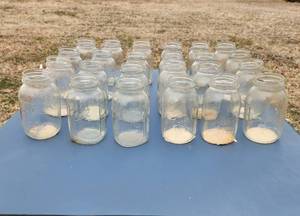 lot 3050 image: (24) Quart Canning Jars - Paper is stuck on the bottom of jars from wet paper