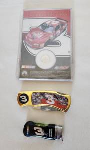 lot 507 image: Dale Earnhardt Commemorative Colorized Coin, Folding Knife and Lighter