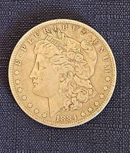 lot 517 image: 1884 P Morgan Silver Dollar