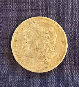 lot 518 image: 1899 O Morgan Silver Dollar