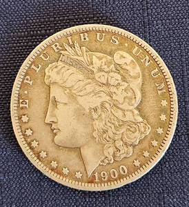 lot 519 image: 1900 O Morgan Silver Dollar