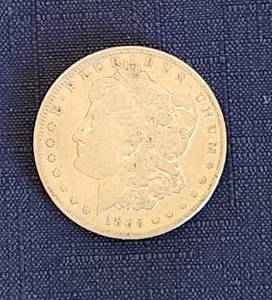 lot 524 image: 1885 O Morgan Silver Dollar