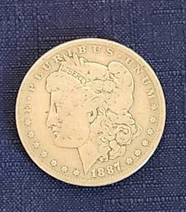 lot 531 image: 1887 O Morgan Silver Dollar