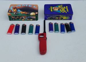 lot 4048 image: Vintage Joe Cool Tins with Original Matches and Lighters