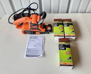 lot 4103 image: Black & Decker Dragster 3 x 21in. Belt Sander Model DS321 and Red Resin Sanding Belts