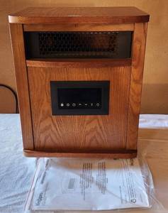 lot 6047 image: Electric Infrared Quartz Heater Model ZCHT1097US