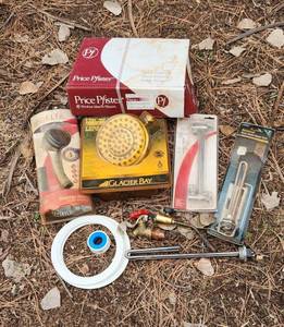 lot 2152 image: Plumbing Lot - Shower Heads and Water Heater Elements