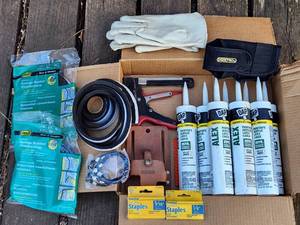 lot 2073 image: Staple Gun, Staples, Caulking, Weather Stripping and Other Misc Tools