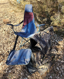 lot 2110 image: Folding Chair with Footrest and Camo Tarp