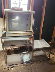 lot 2116 image: RCA Color Trak TV, Antenna, 5 Black & White TV and Metal Shelf 49 x 16 x 30