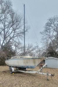 lot 552 image: 23ft 1976 Clipper Sailboat Model CM23 and 20ft EZ Roller Model 20CBH2600 Trailer - THIS ITEM HAS THE OPTION FOR A DIFFERENT REMOVAL DAY...PLEASE CALL 316-655-0218 with any question