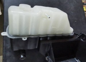 lot 3533 image: Vehicle Coolant Replacement Part With Cap