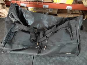 lot 7447 image: Rockland Black Duffle 28x13x15 Wheels &amp Handle
