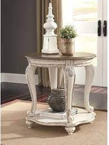 lot 1693 image: Ashley Realyn Round Table 27D BrownWhite- Retail $189.99