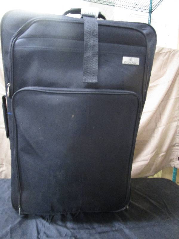 lot 2288 image: protege suitcase