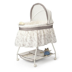 lot 10068 image: Delta Children Deluxe Sweet Beginnings Bassinet, Falling Leaves