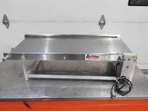 lot 10280 image: BELSHAW DONUT FEEDING TABLE