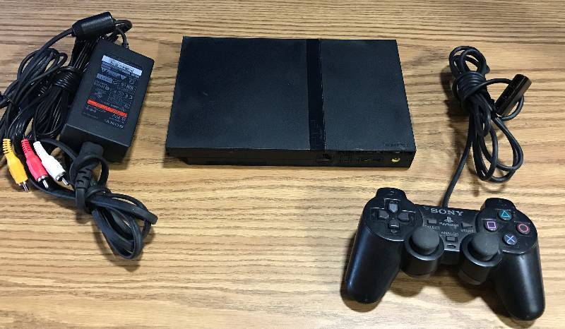 lot 3375 image: Sony Playstation 2 SCPH-77001 With Hoop-ups and Controller