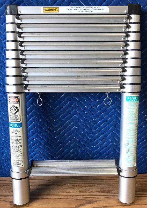 lot 3399 image: 10-12-ft Aluminum 250-lb Telescoping Type I Extension Ladder